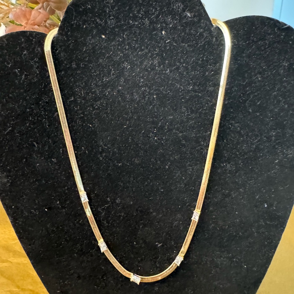 18k gold plated snake chain with CZ’s. NWT